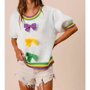 Chic White Sweater with Colorful Bow Accents